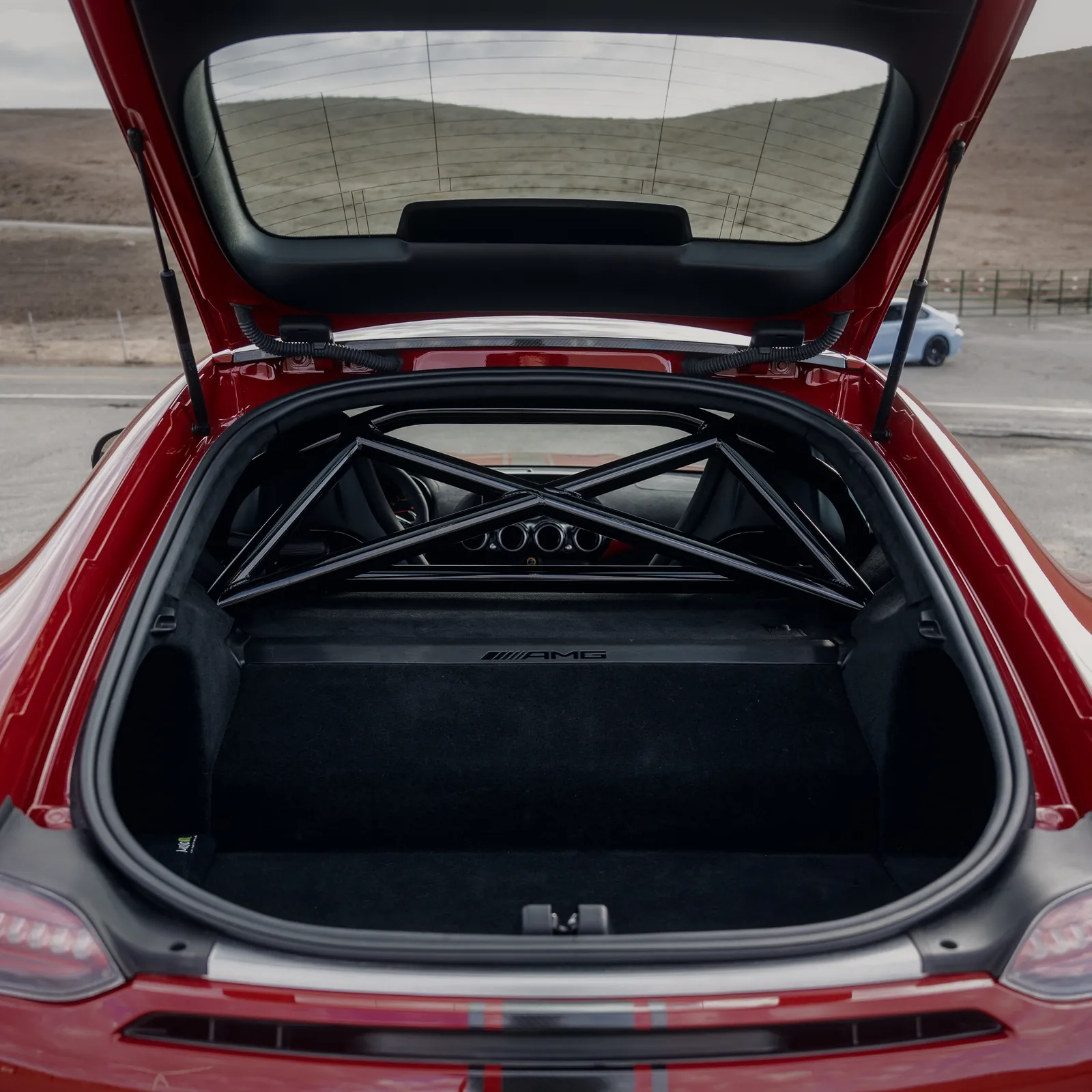Mercedes-AMG GT R rear hatch open, showing the roll cage