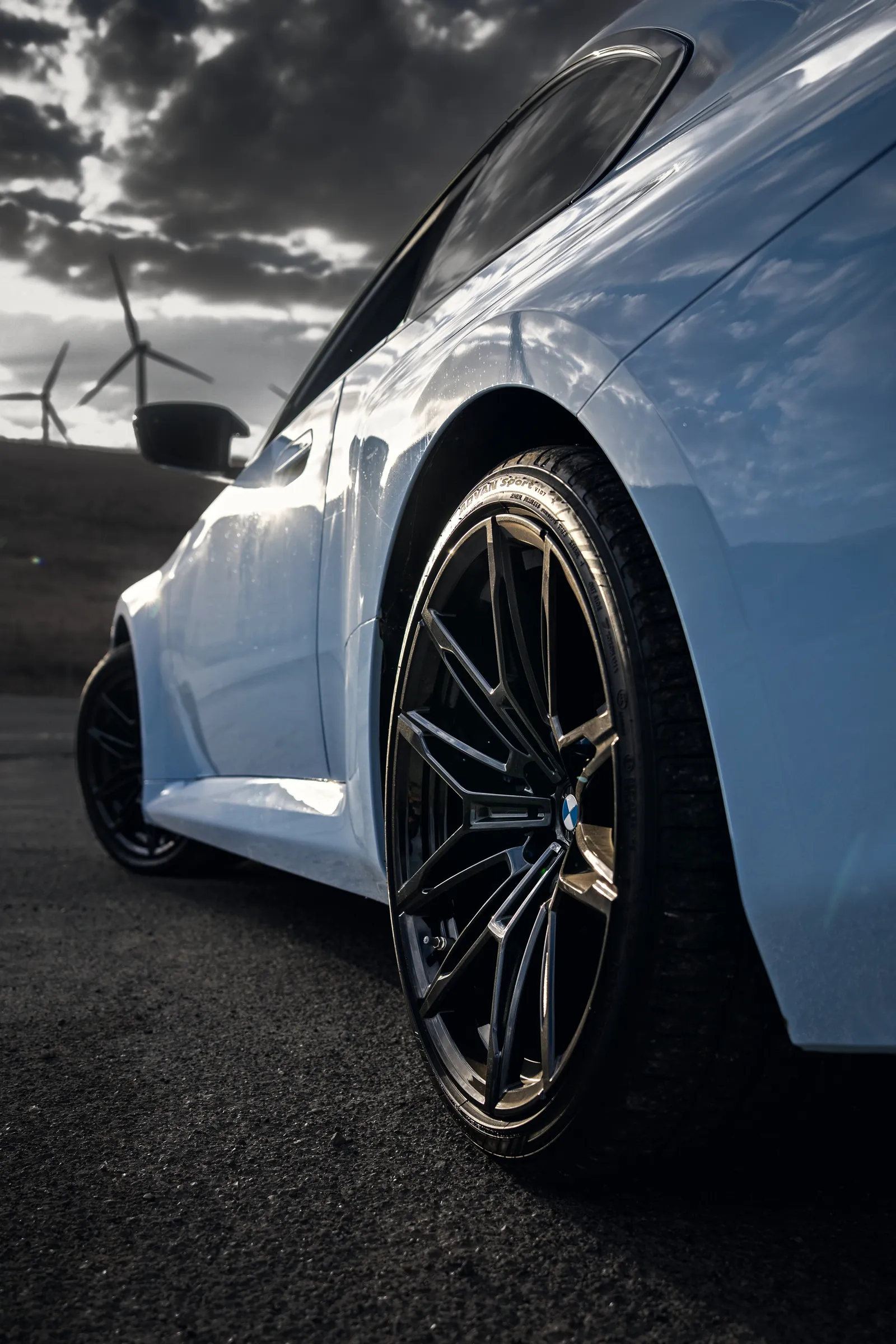 BMW M2 rear wheel and fender from ground level